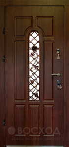 Фото  Стальная дверь Дверь с ковкой №10 с отделкой Винилискожа